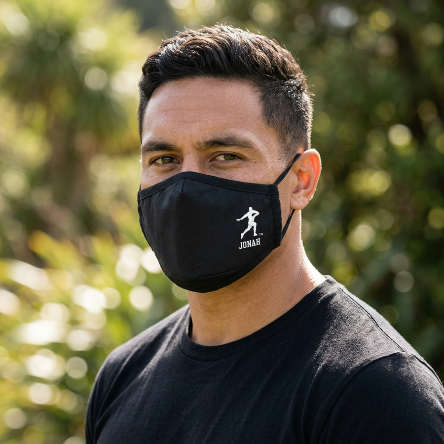 Olive-skinned male model wearing the black Jonah Fend face mask